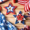 6-piece set of patriotic wooden star decorations in red, white, and blue, perfect for tabletop centerpieces, tiered trays, shelves, or home and office décor for Independence Day and Memorial Day celebrations.